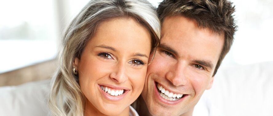 woman and man with good vision after its restoration